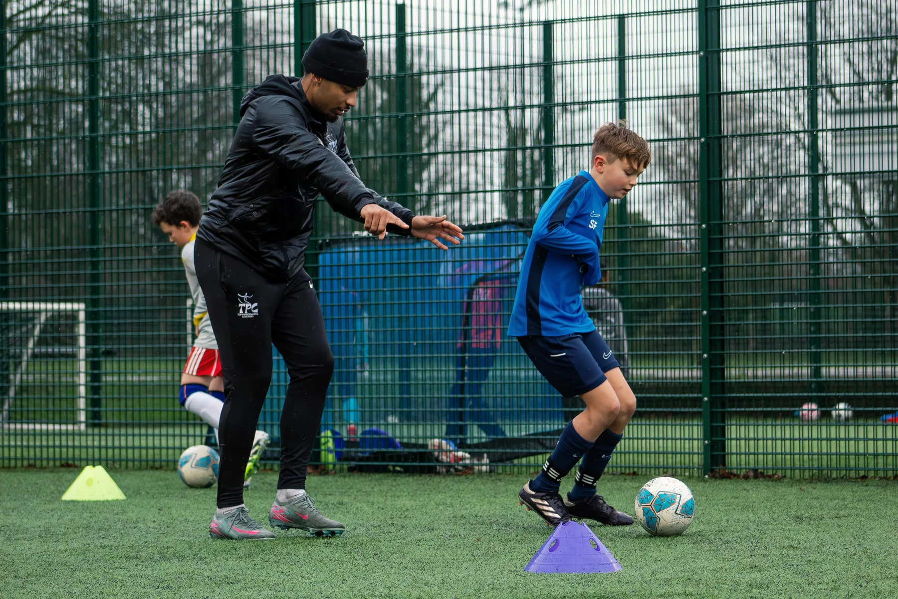 Tyreace demonstrating footwork during a coaching session