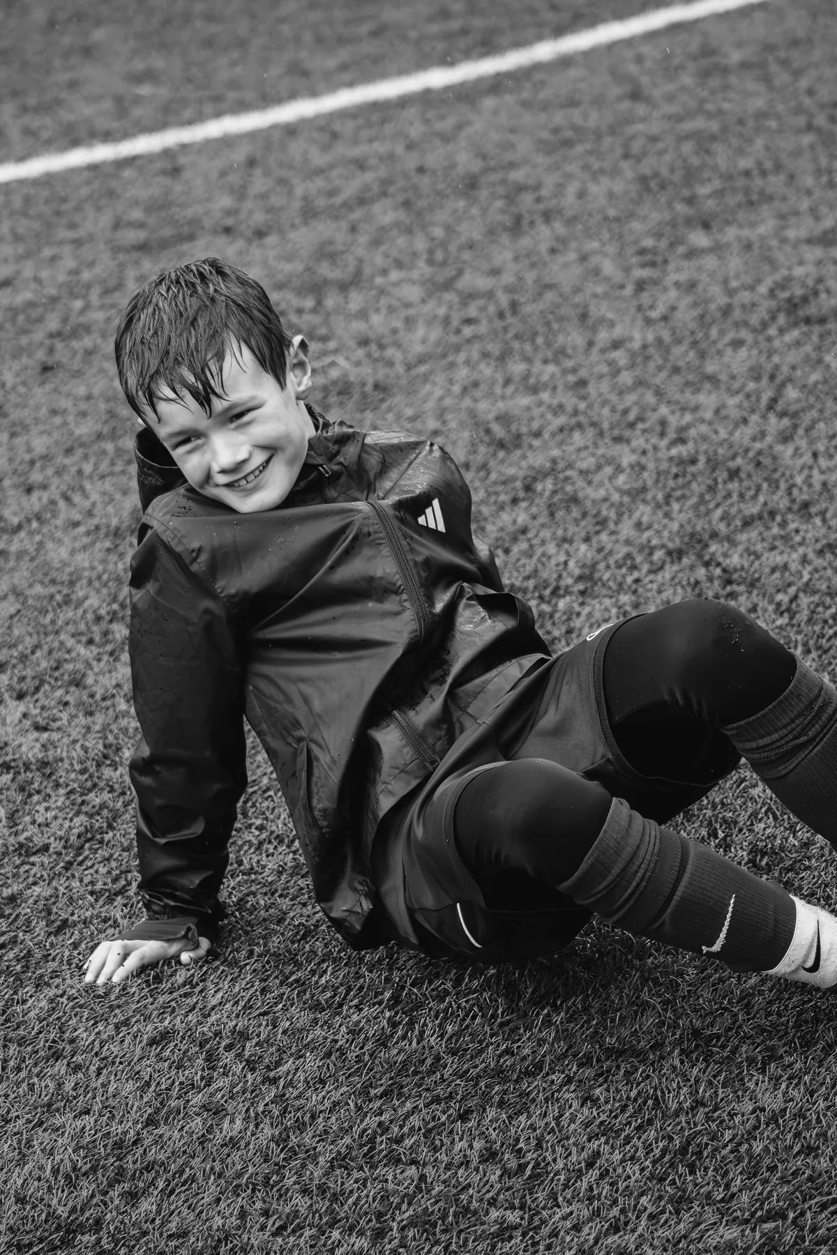 Young player smiling after training